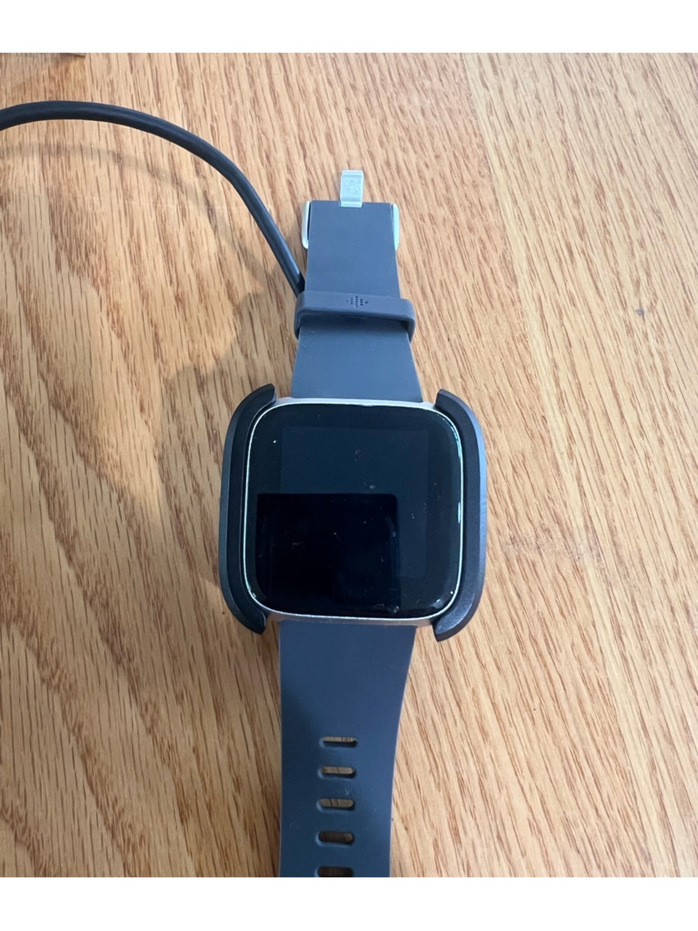 fitbit Versa Series Smartwatch with Slate Blue Silicone Band and charger